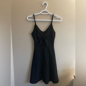 Women’s black dress with a bow size small